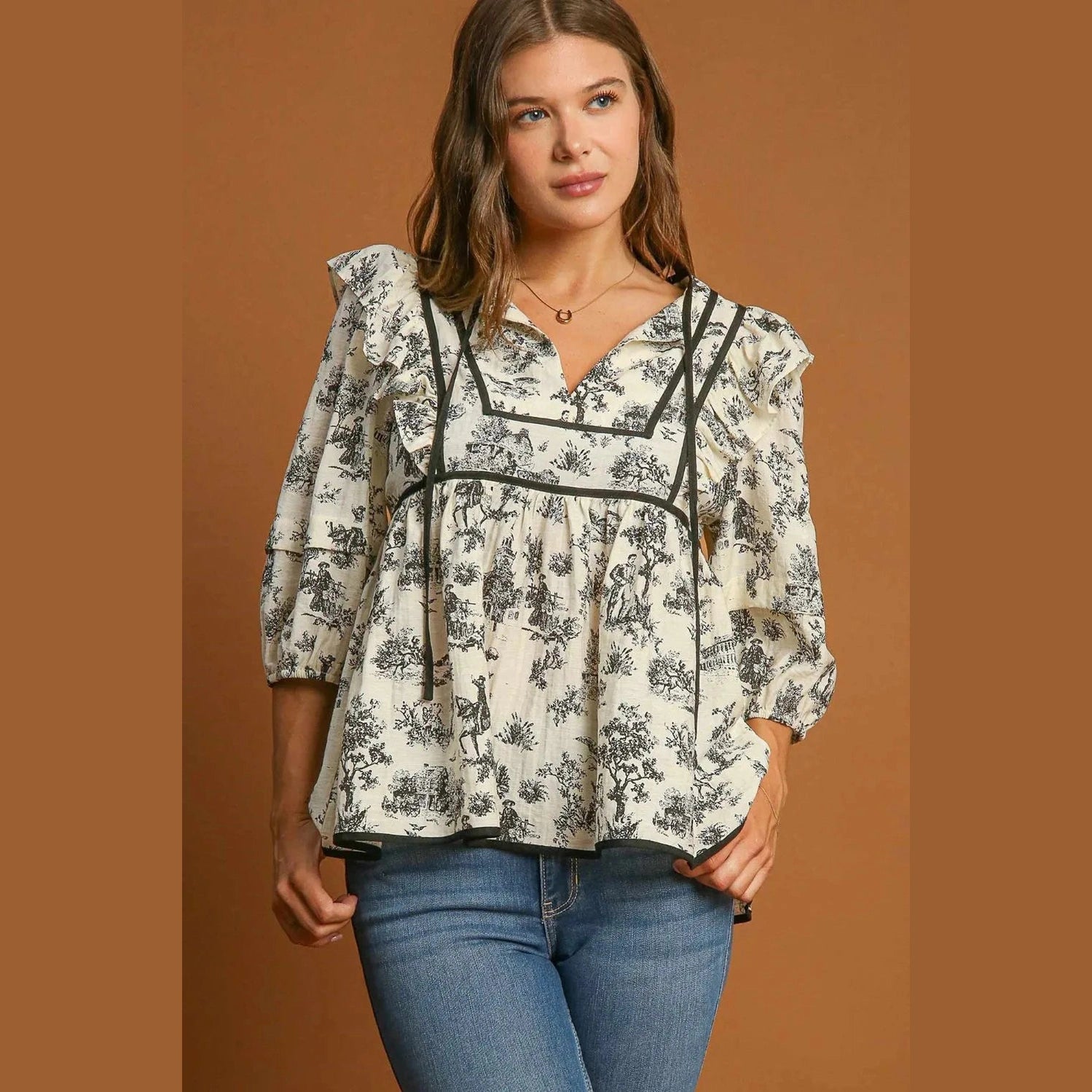 Umgee Ruffled Tie Neck Puff Sleeve Babydoll Blouse