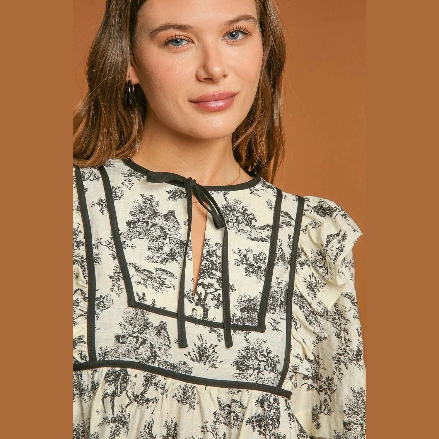 Umgee Ruffled Tie Neck Puff Sleeve Babydoll Blouse